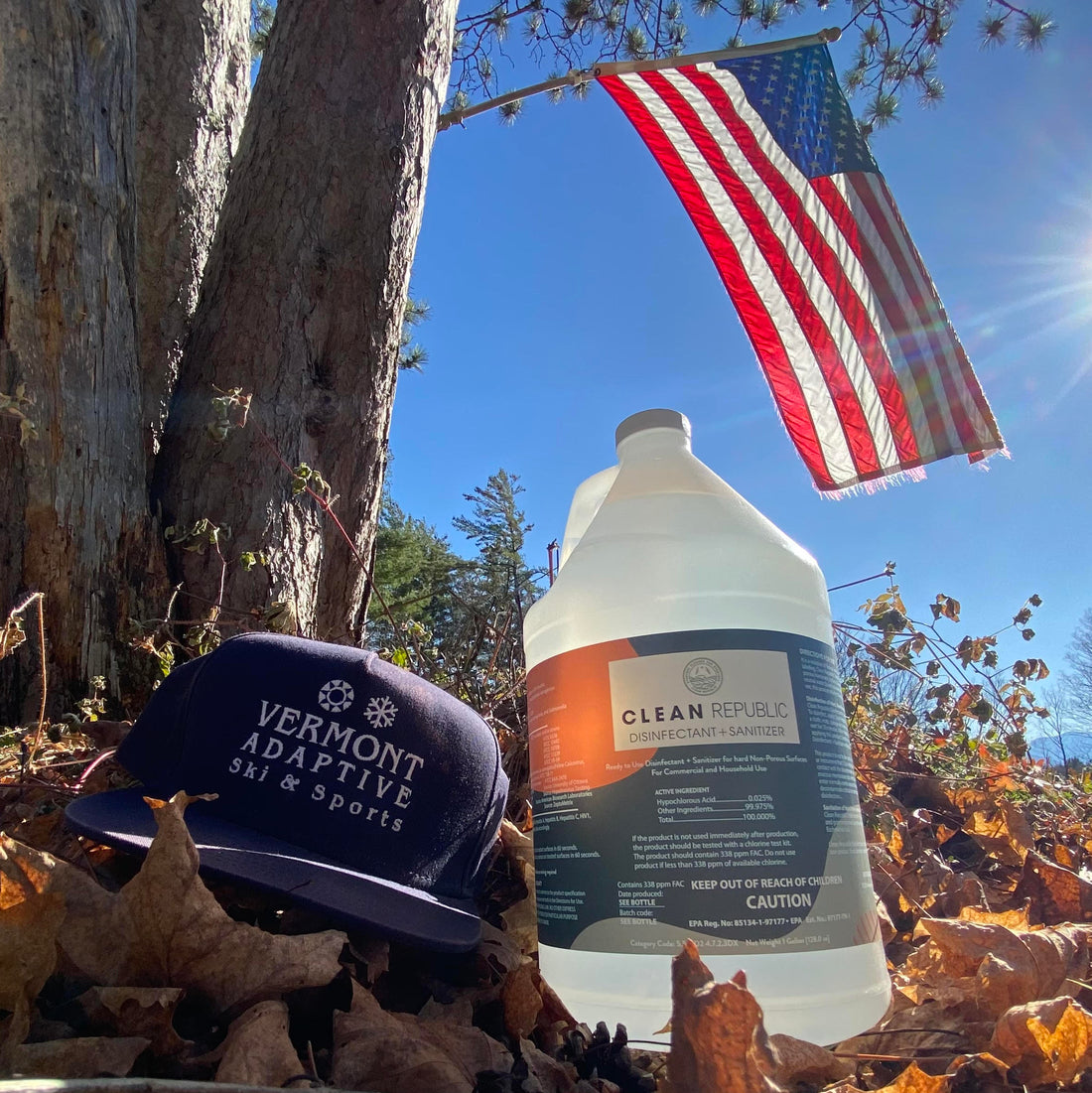 clean republic products with a cap and american flag by a tree outdoors